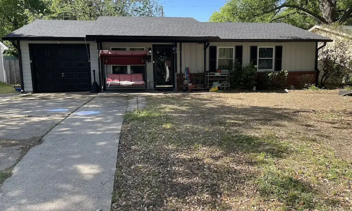 Asphalt Shingle Roof Repair crew at work on a residential roof in Zephyrhills
